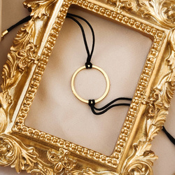 Srebrna pr.925 bransoletka z czarnym sznurkiem - pozłacane kółko