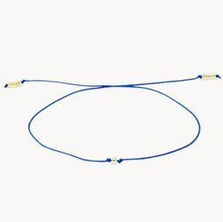 Bransoletka pozłacana na chabrowym sznurku na szczęście z kuleczką