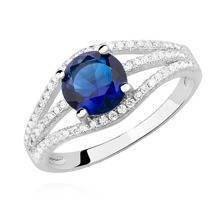 Pierścionek srebrny z potrójną szyną j niebieską cyrkonią