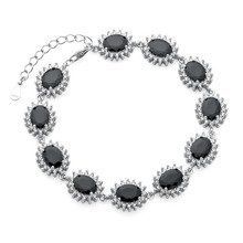 Bransoletka Lady Di srebrna królewska z dużymi czarnymi oczkami